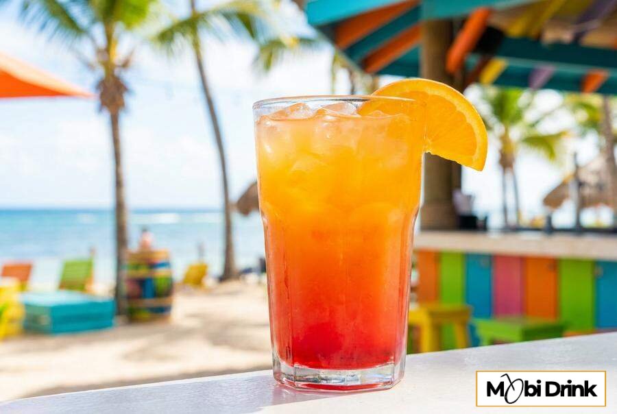 Warstwowy drink Jameson Orange Sunrise z sokiem pomarańczowym